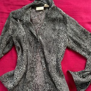 Sheer women’s snakeskin button up shirt! Super easy to dress up or down